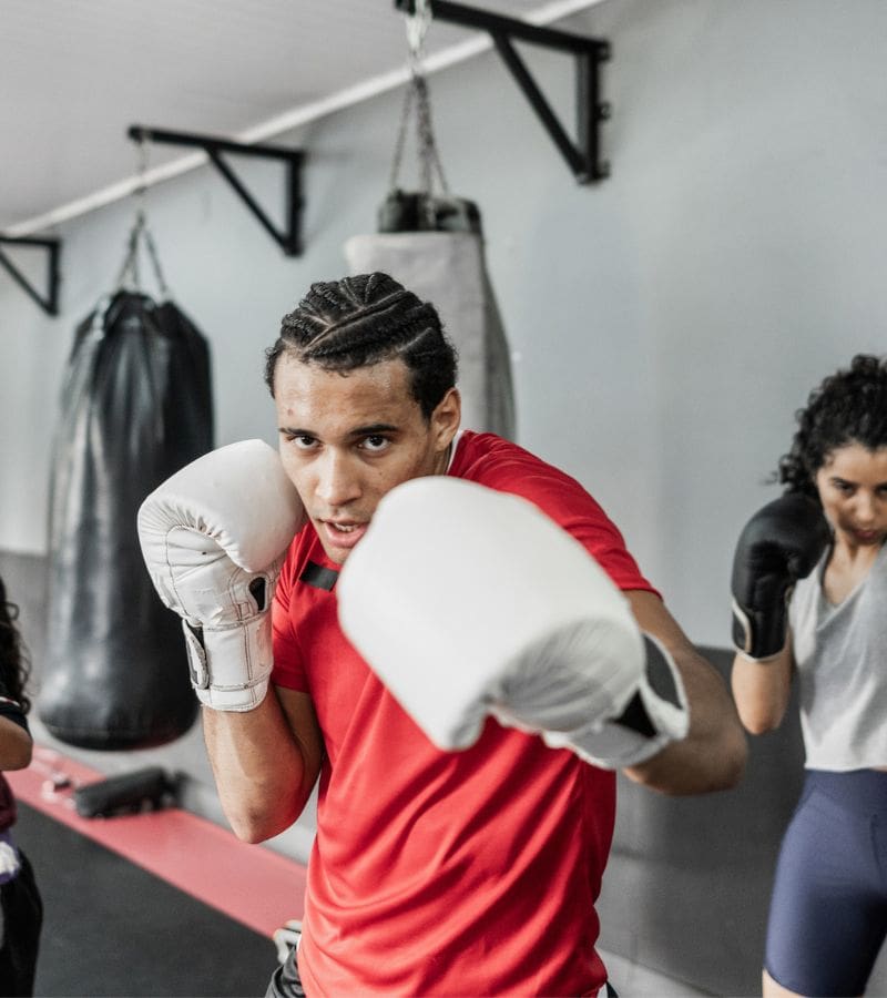 Kickboxing class at Powerhouse Gym Linden with members training together, highlighting group fitness and high-energy workouts.